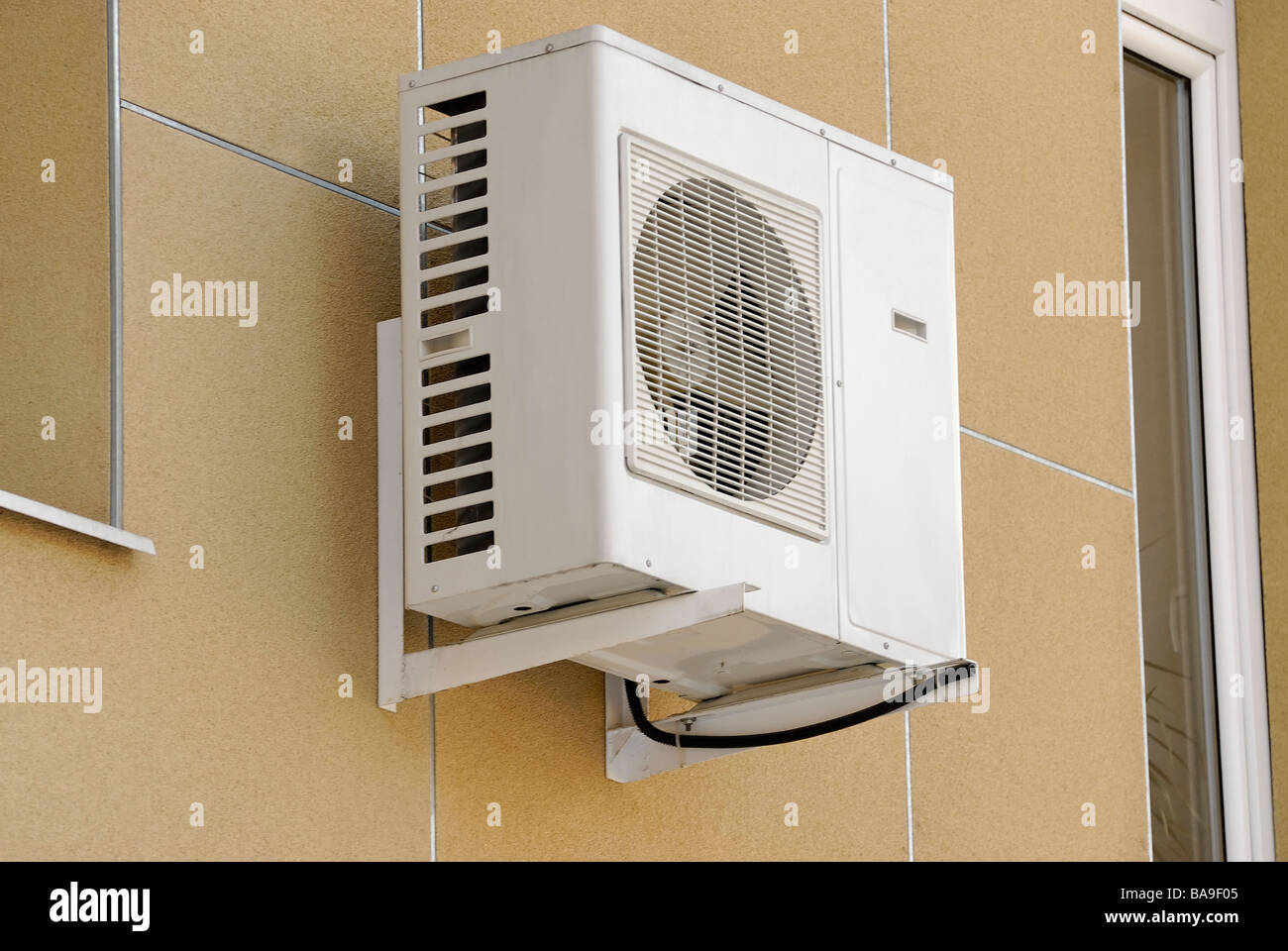 The external block of the air conditioner on the building wall Stock Photo  - Alamy