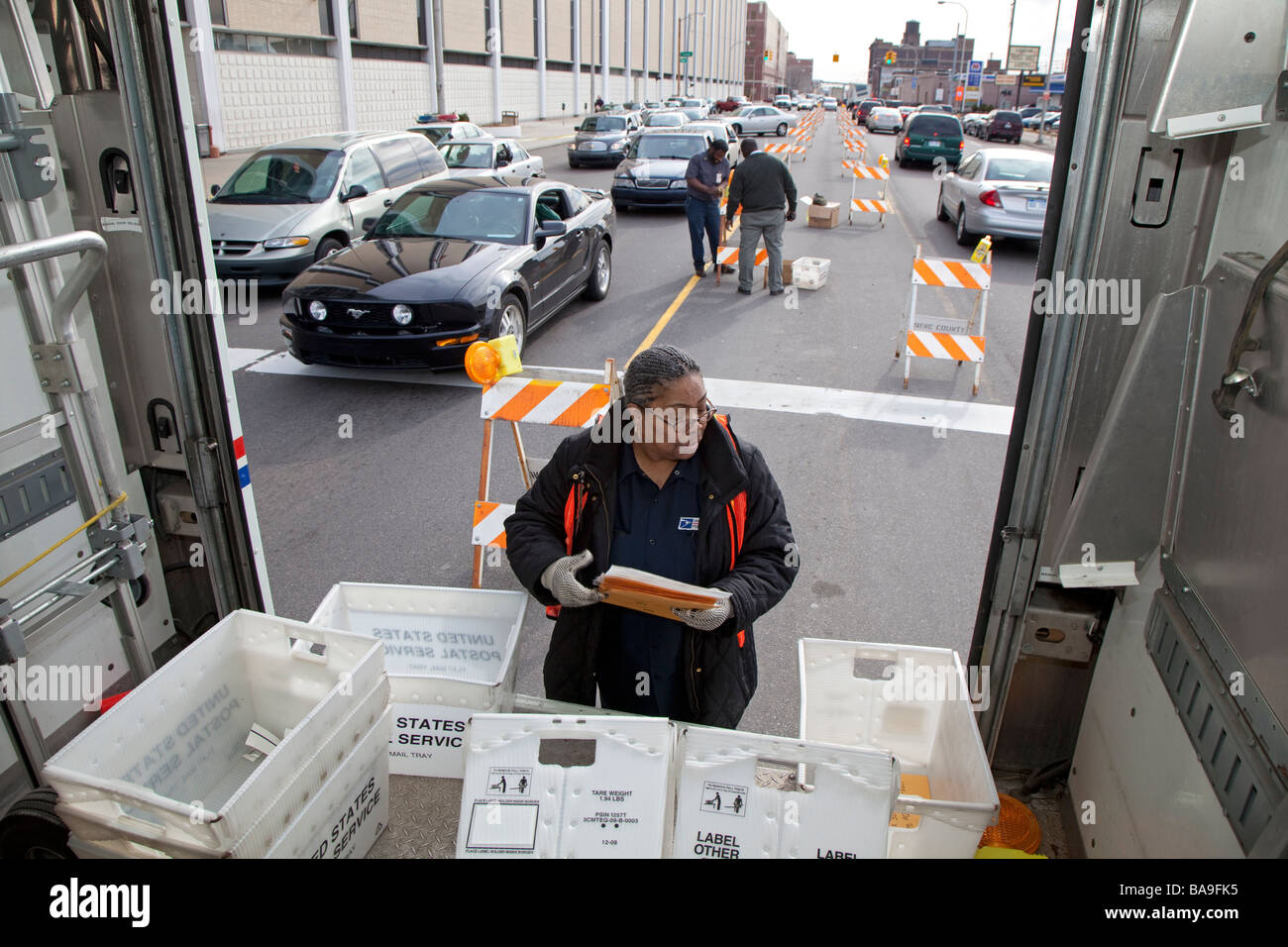 Postal Workers Collect Tax Returns Just Before Filing Deadline