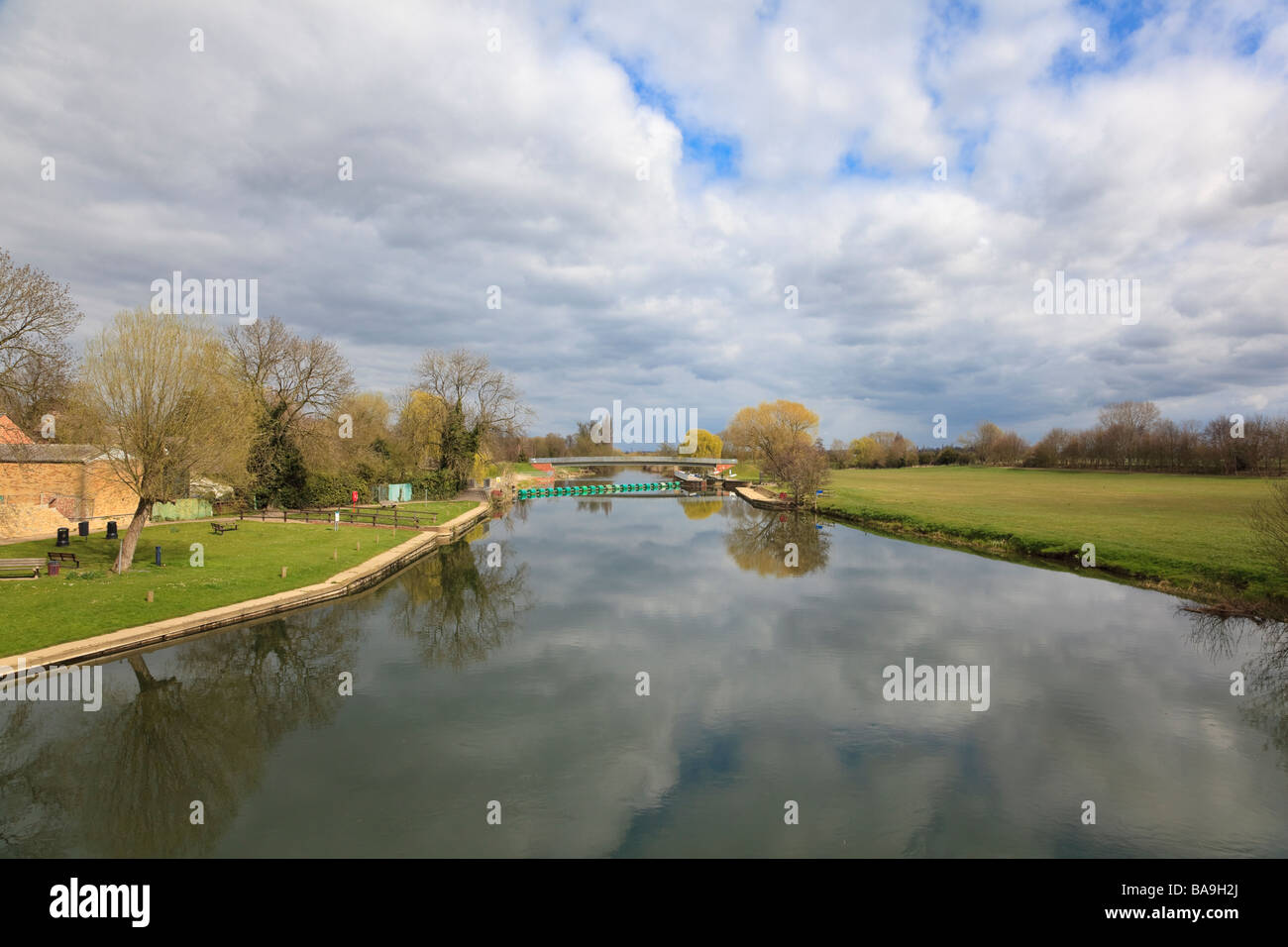 The River Great Ouse reflecting the Cloudy Sky at Great Barford Bedfordshire Stock Photo