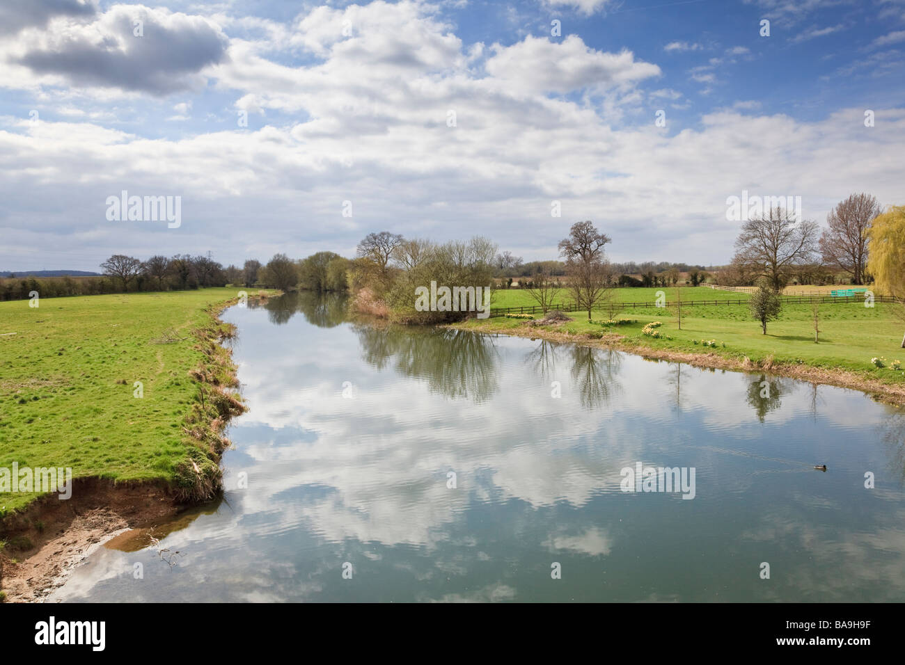 The River Great Ouse reflecting the Cloudy Sky, at Great Barford, Bedfordshire Stock Photo