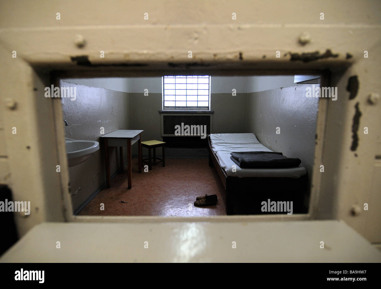 Jail cell in former east German prison, Berlin Stock Photo