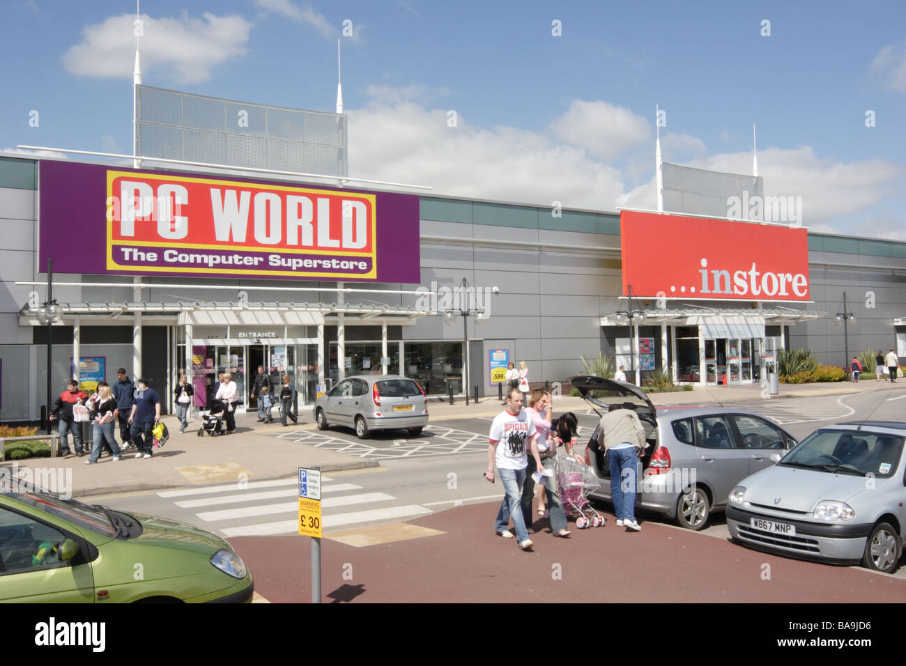 People shopping at PC World and Instore, Parkgate Shopping, Rotherham Stock Photo