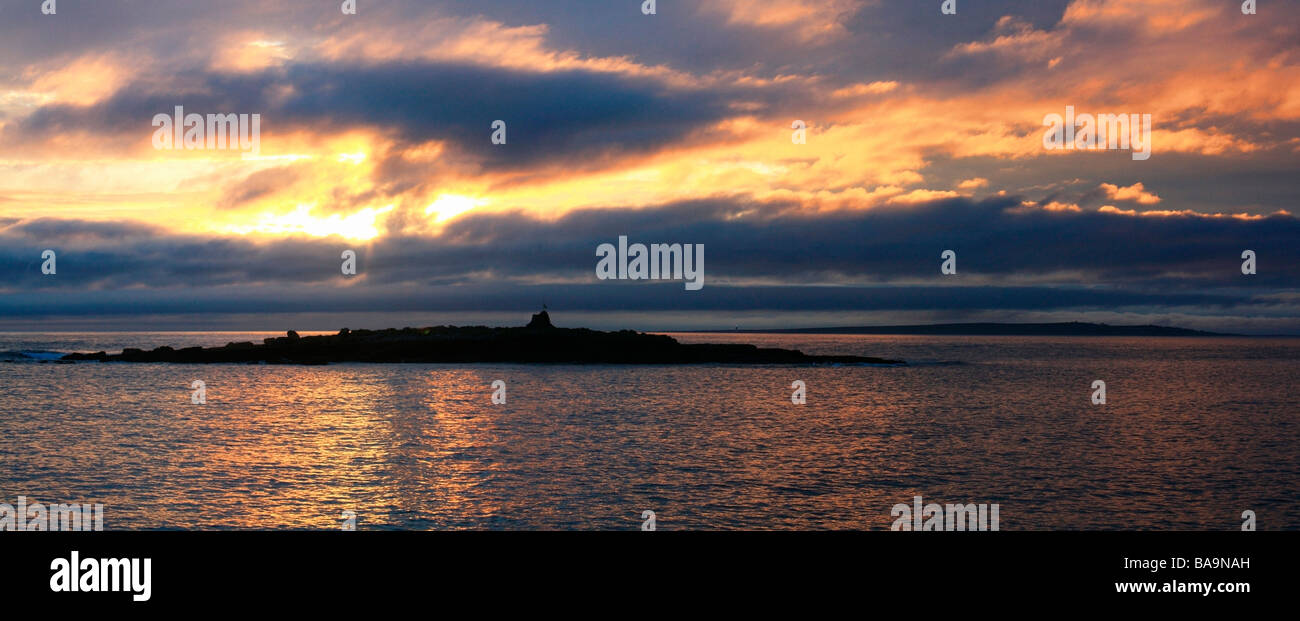 Doolin Harbour, County Clare, Ireland; Sunset with Aran Islands Stock Photo