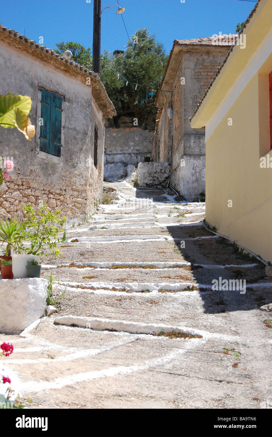 View of narrow road and traditional houses in village Keri in the island of Zakynthos, Greece. Stock Photo