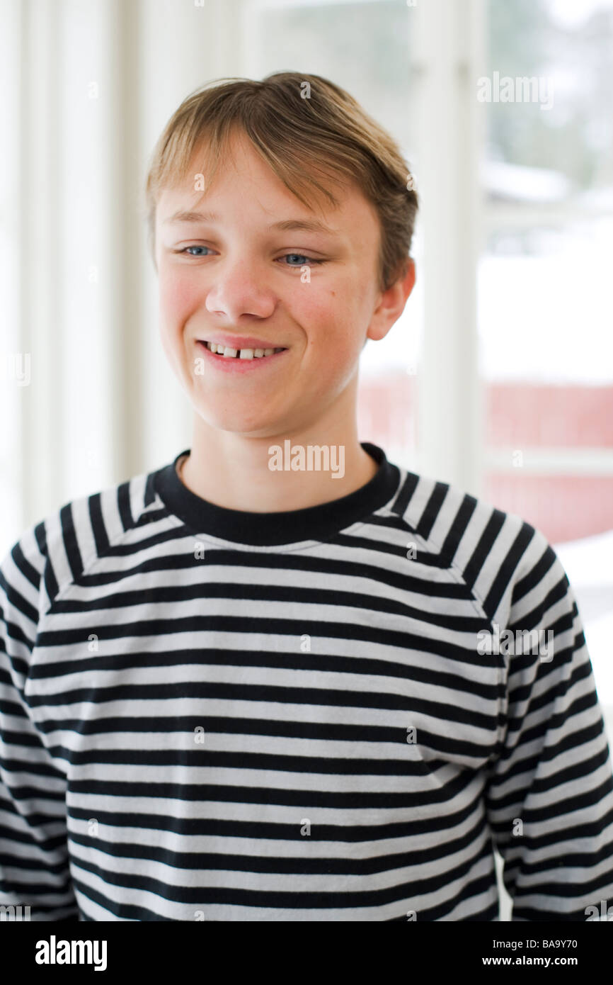 Portrait of a smiling boy, Sweden. Stock Photo