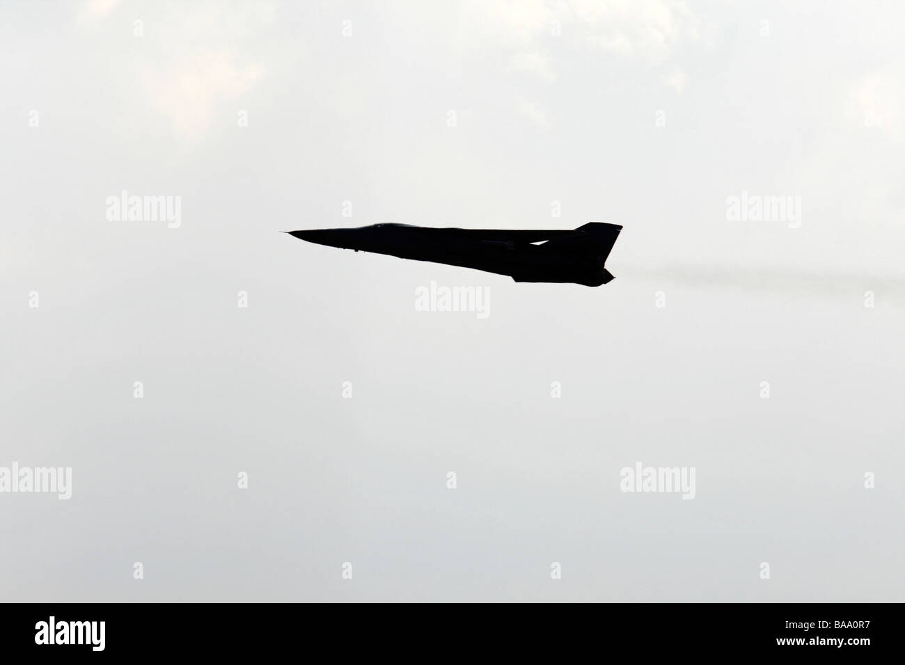 General Dynamics F 111 Swing Wing Fighter Bomber in Flight Stock Photo