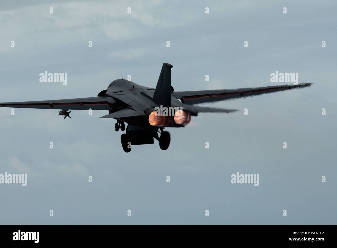 General Dynamics F 111 Swing Wing Fighter Bomber in Flight Stock Photo