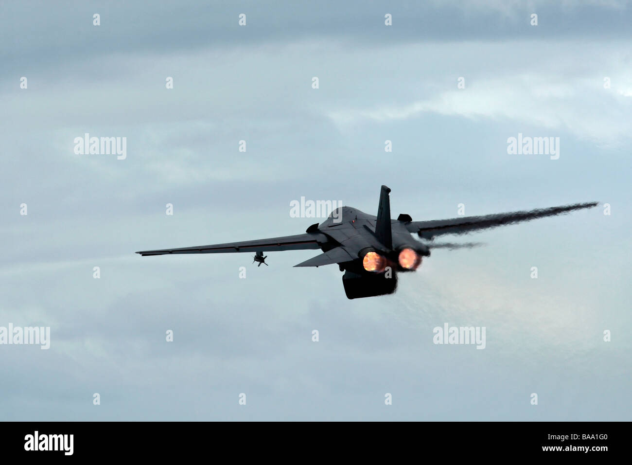 General Dynamics F 111 Swing Wing Fighter Bomber in Flight Stock Photo