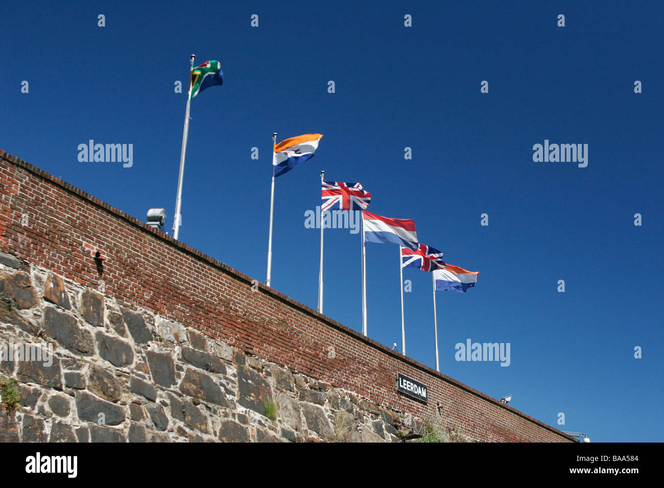 The 5 historical flags of South Africa in chronological order on the wall of the Castle of Good hope in Cape Town South Africa Stock Photo