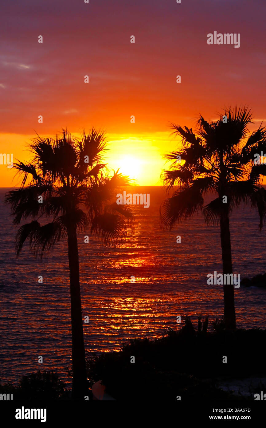 THE SUN SETTING OVER KISSONERGA BAY ON THE ISLAND OF CYPRUS. Stock Photo