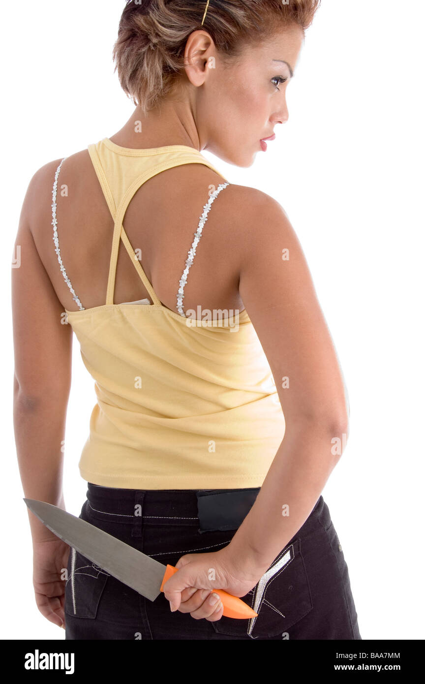 back pose of woman with knife Stock Photo - Alamy