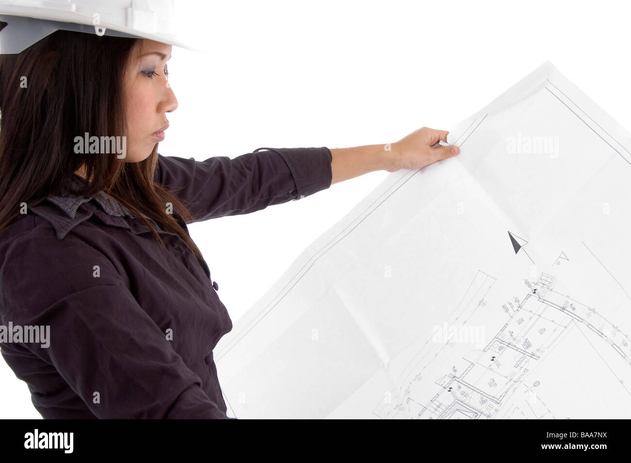 female architect looking at blueprints Stock Photo - Alamy