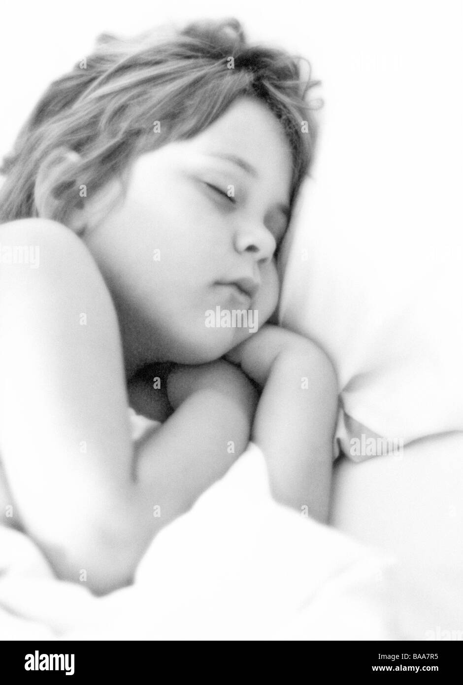 Young girl asleep Stock Photo
