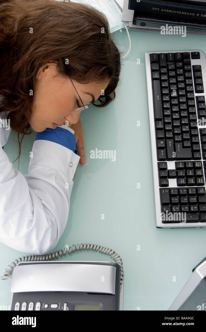 young doctor sleeping in clinic Stock Photo Alamy