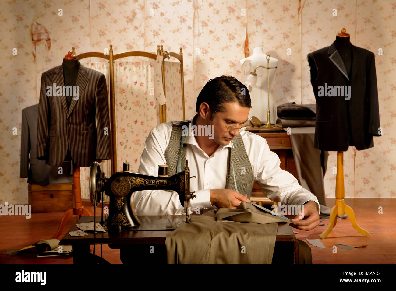Tailor dressmaker at work Stock Photo - Alamy