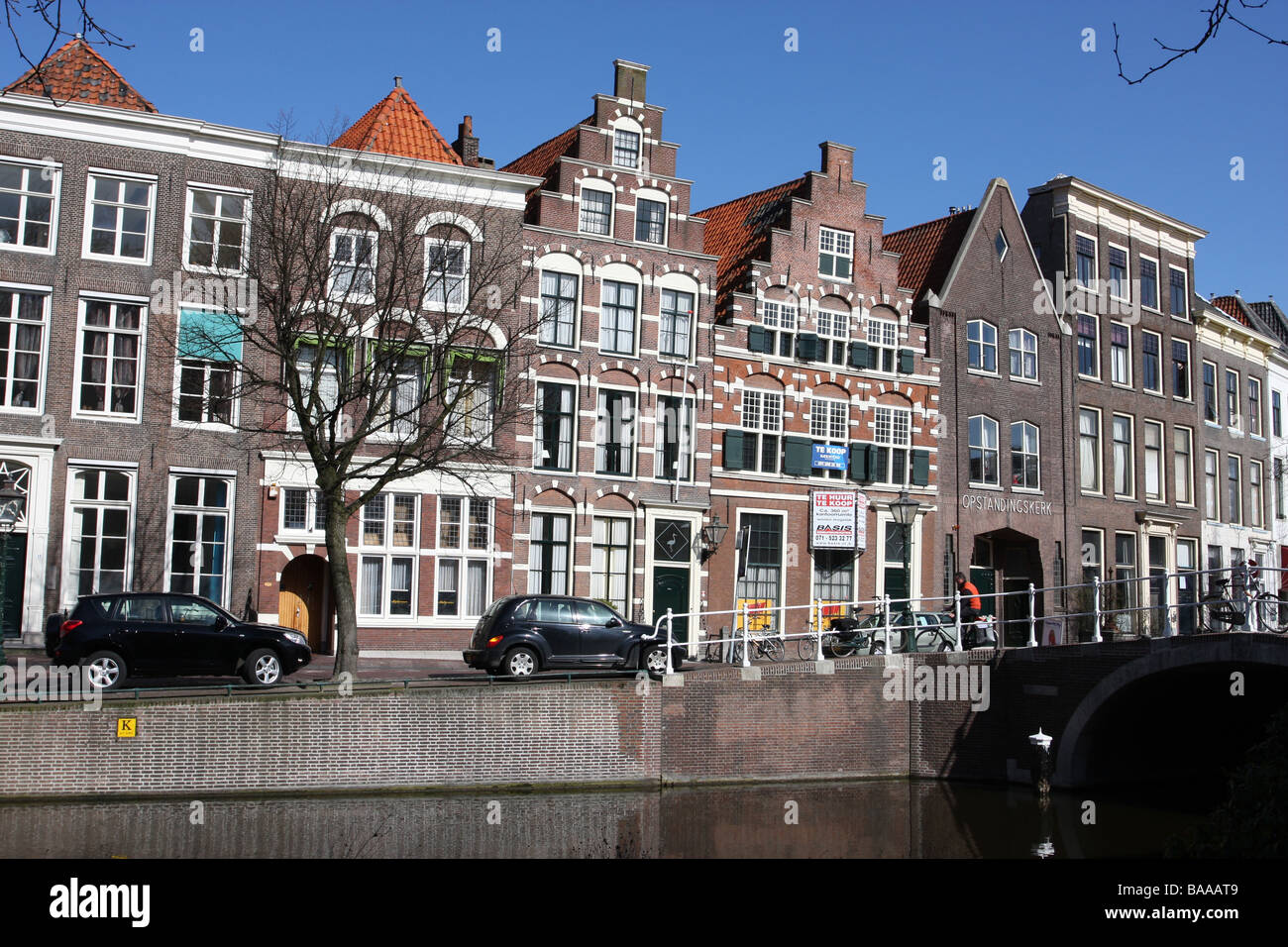 A canal and typical dutch houses in Leiden, Holland Stock Photo Alamy