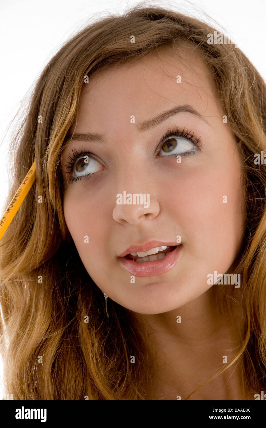 school girl with a pencil in her hair Stock Photo - Alamy
