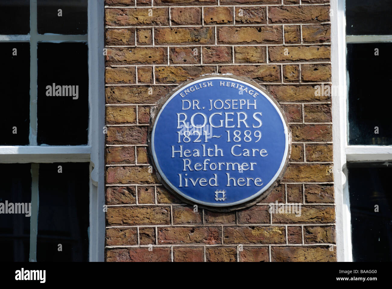 English Heritage blue plaque marking the house once occupied by health care reformer Dr Joseph Rogers in Dean Street London W1 Stock Photo