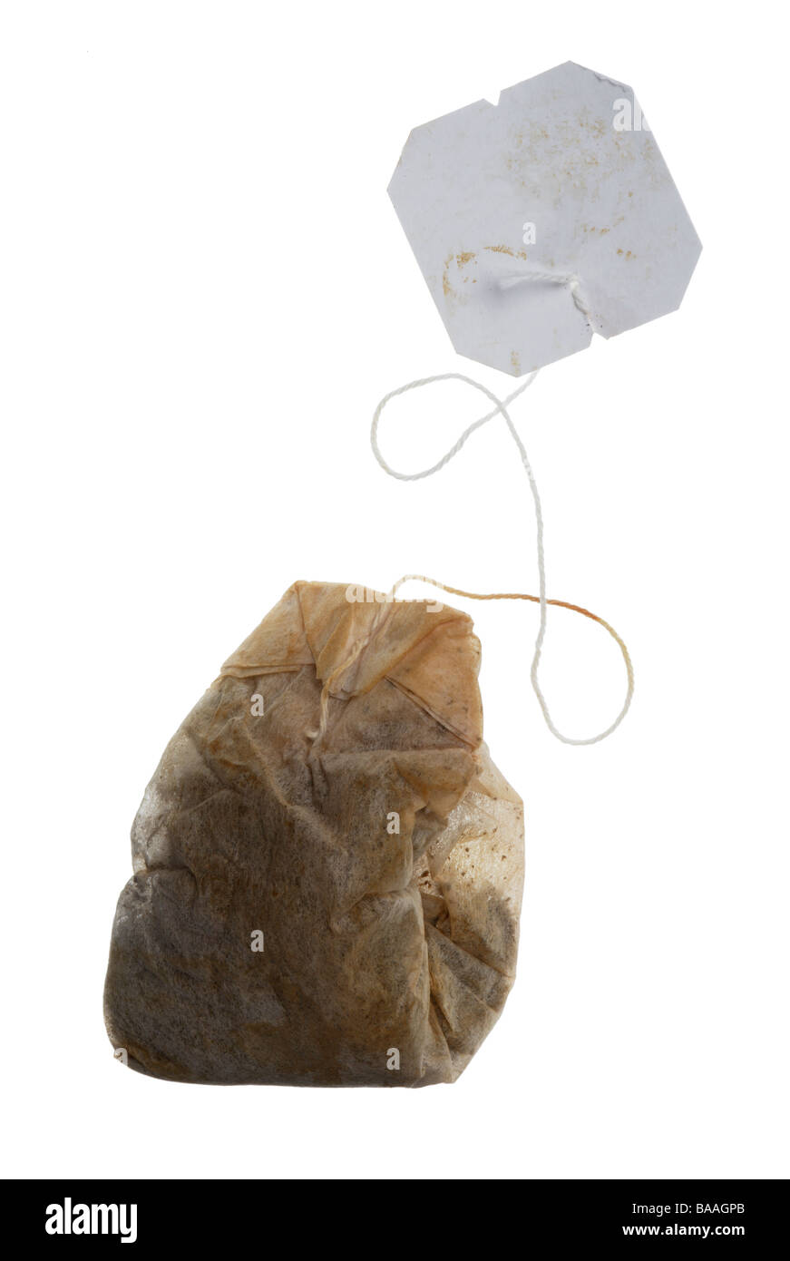 Used tea bag and string tag Stock Photo