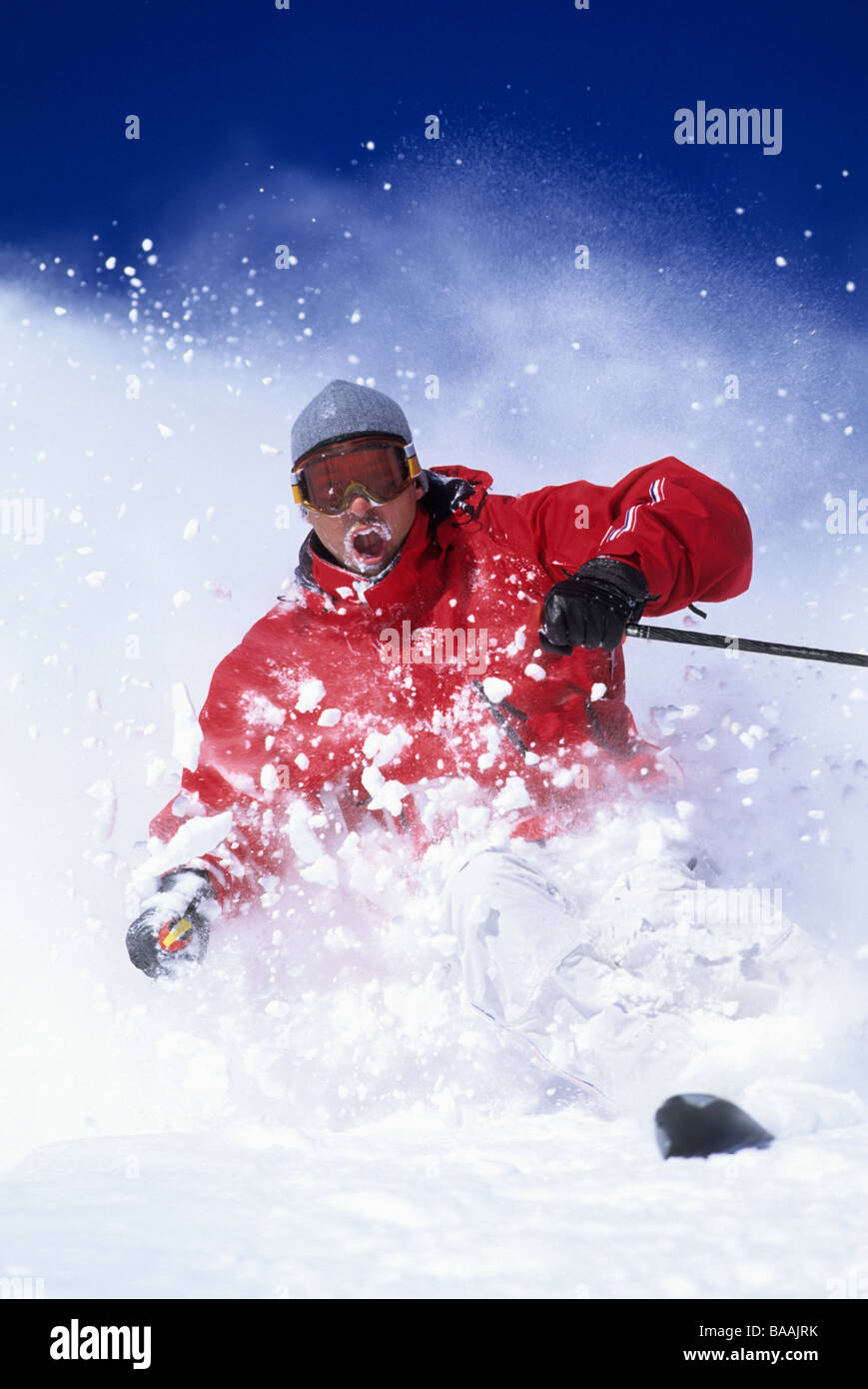 Man downhill skiing in Utah on a sunny day. Stock Photo