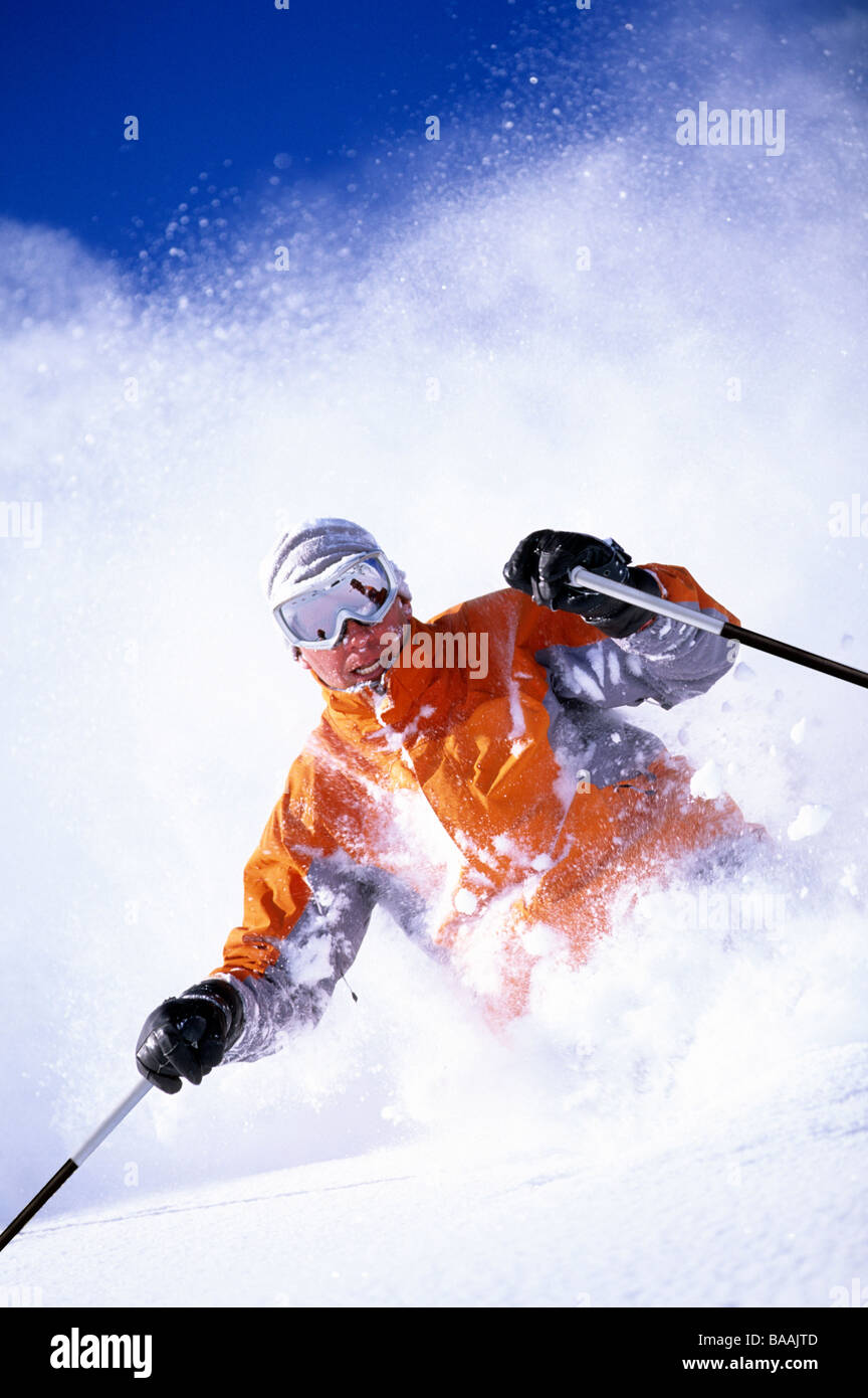 Man downhill skiing in Utah on a sunny day. Stock Photo