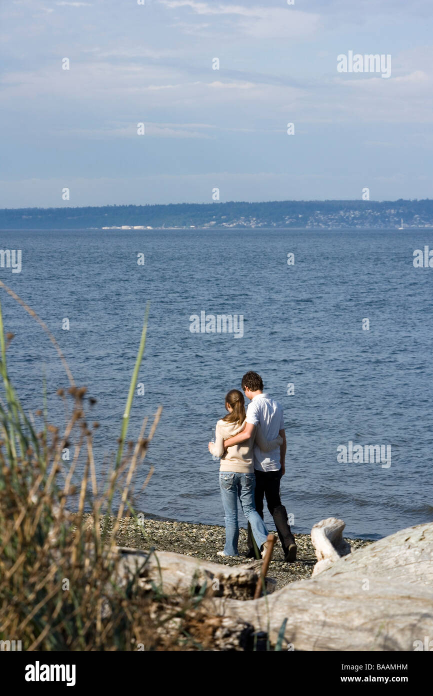 Couple walking talking in park hi-res stock photography and images - Alamy