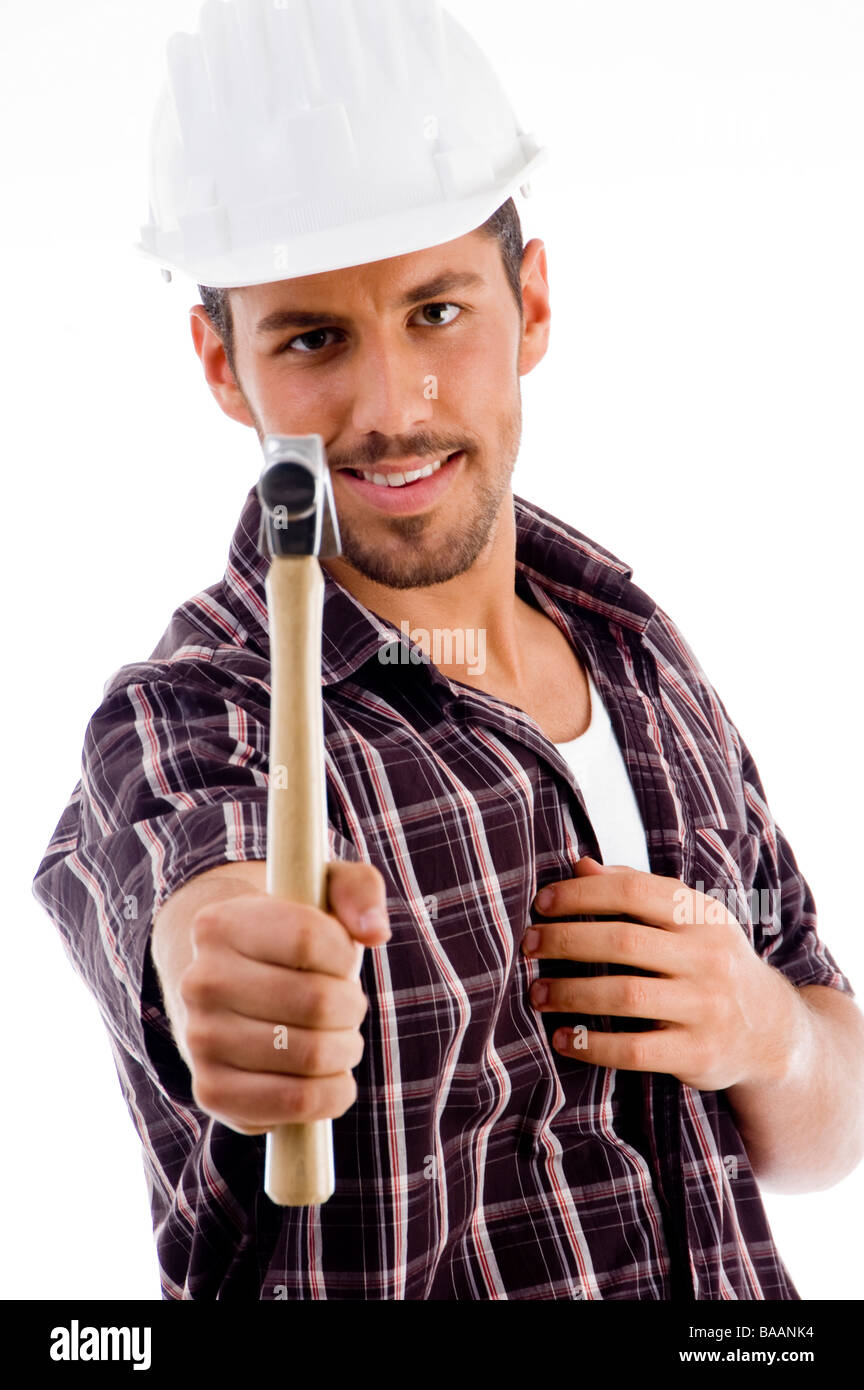 smiling engineer showing hammer Stock Photo Alamy