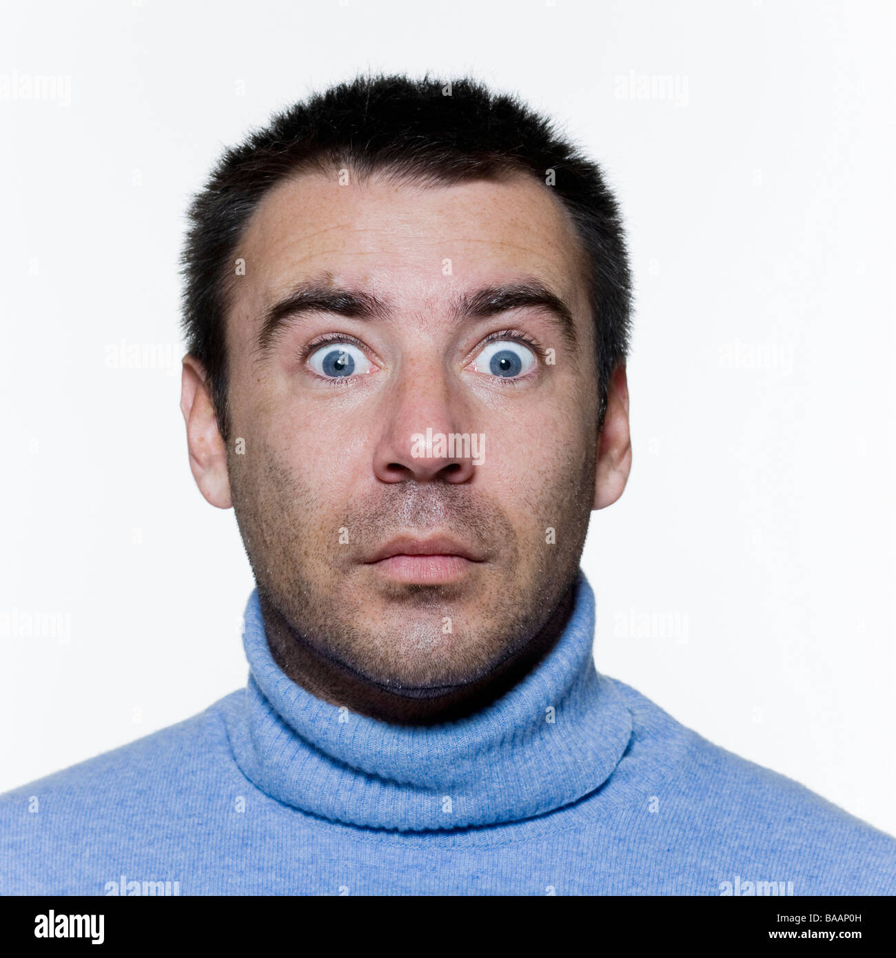 expressive portrait on isolated background of a handsome man Stock Photo