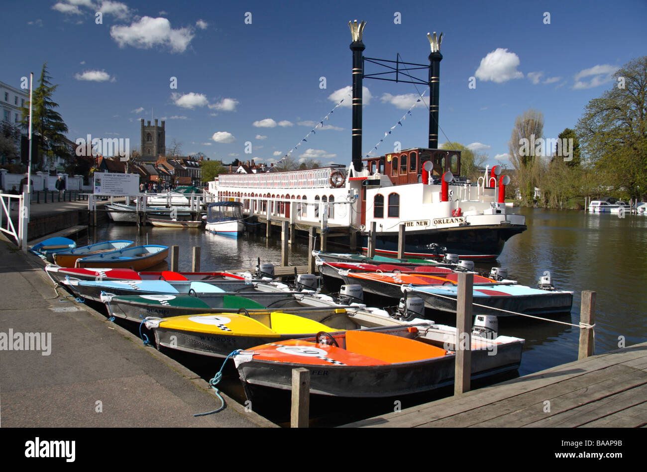 Colourful tourist motor boats for hire on the River Thames at Henley on