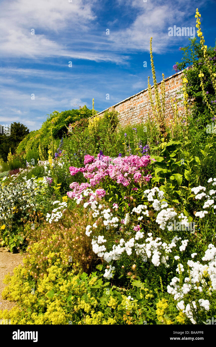 Colourful herbaceous perennial border on a sunny day at Waterperry Gardens Wheatley Oxfordshire Oxon England UK Stock Photo