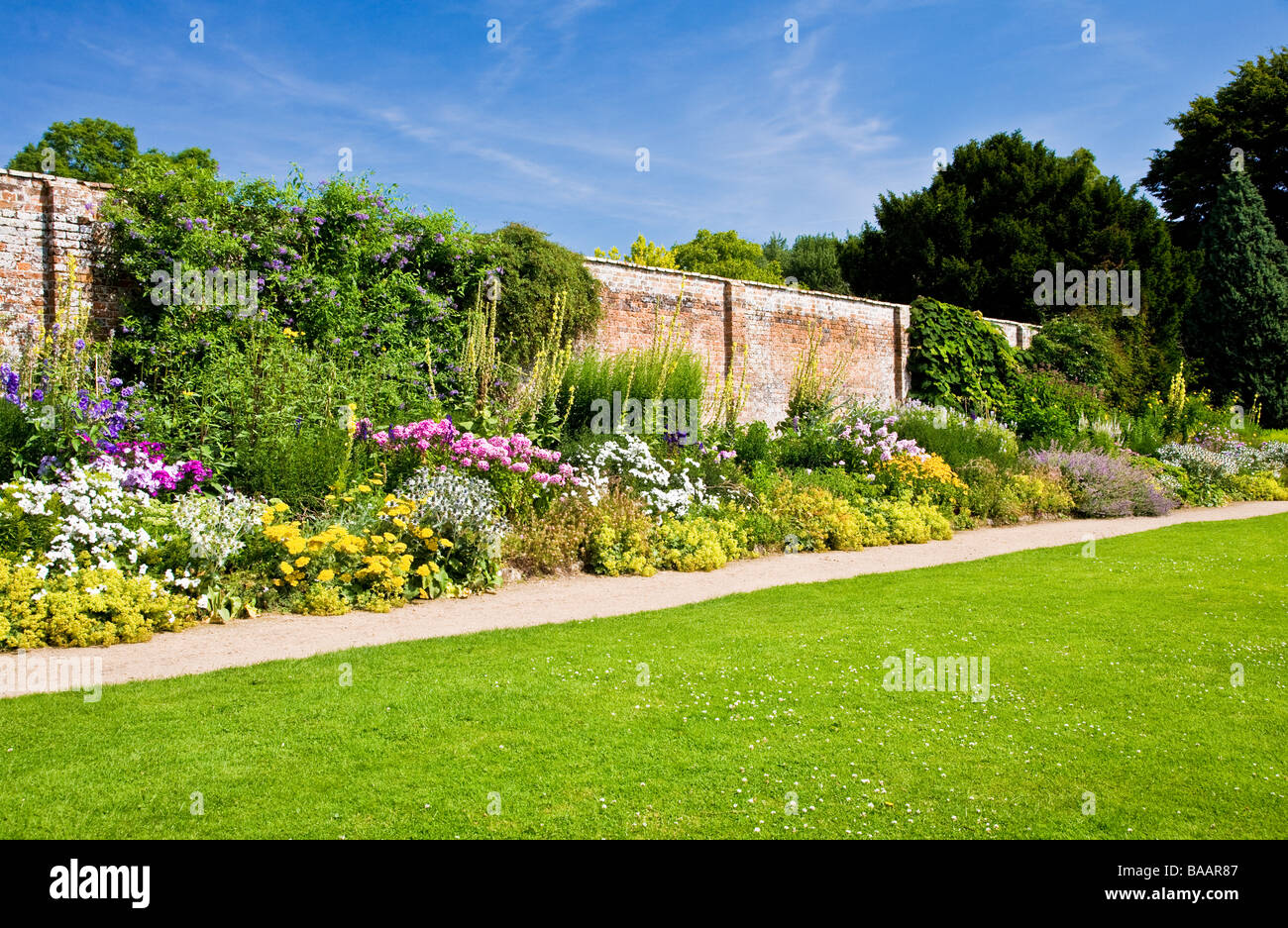 Colourful herbaceous perennial border in July summer at Waterperry ...