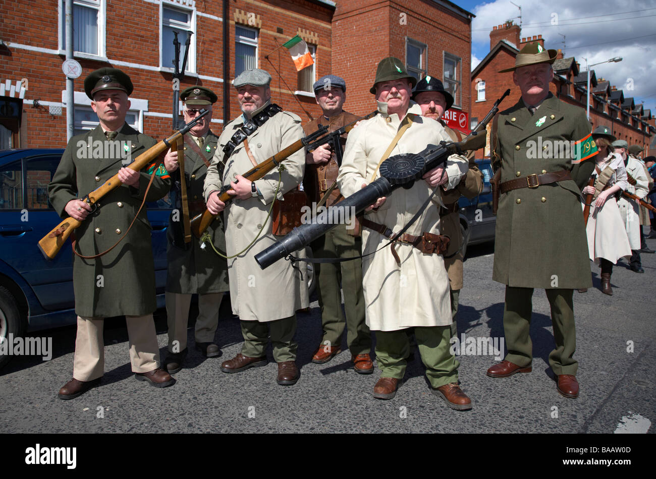 reinactors dressed in period costume representing an IRA flying column on Easter Sunday at the Easter Rising Commemoration Falls Stock Photo