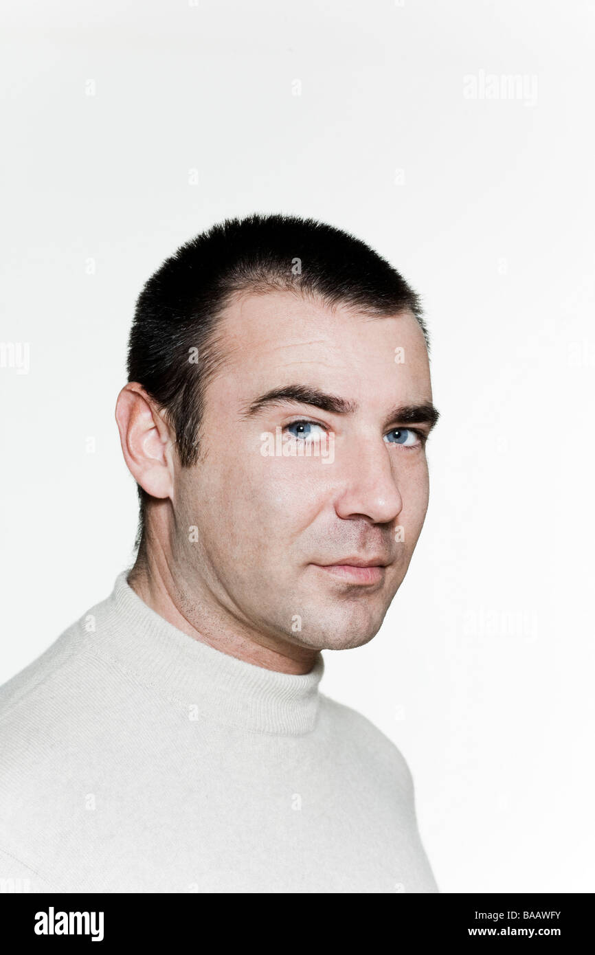 Portrait of an handsome expressive man in studio on white isolated ...