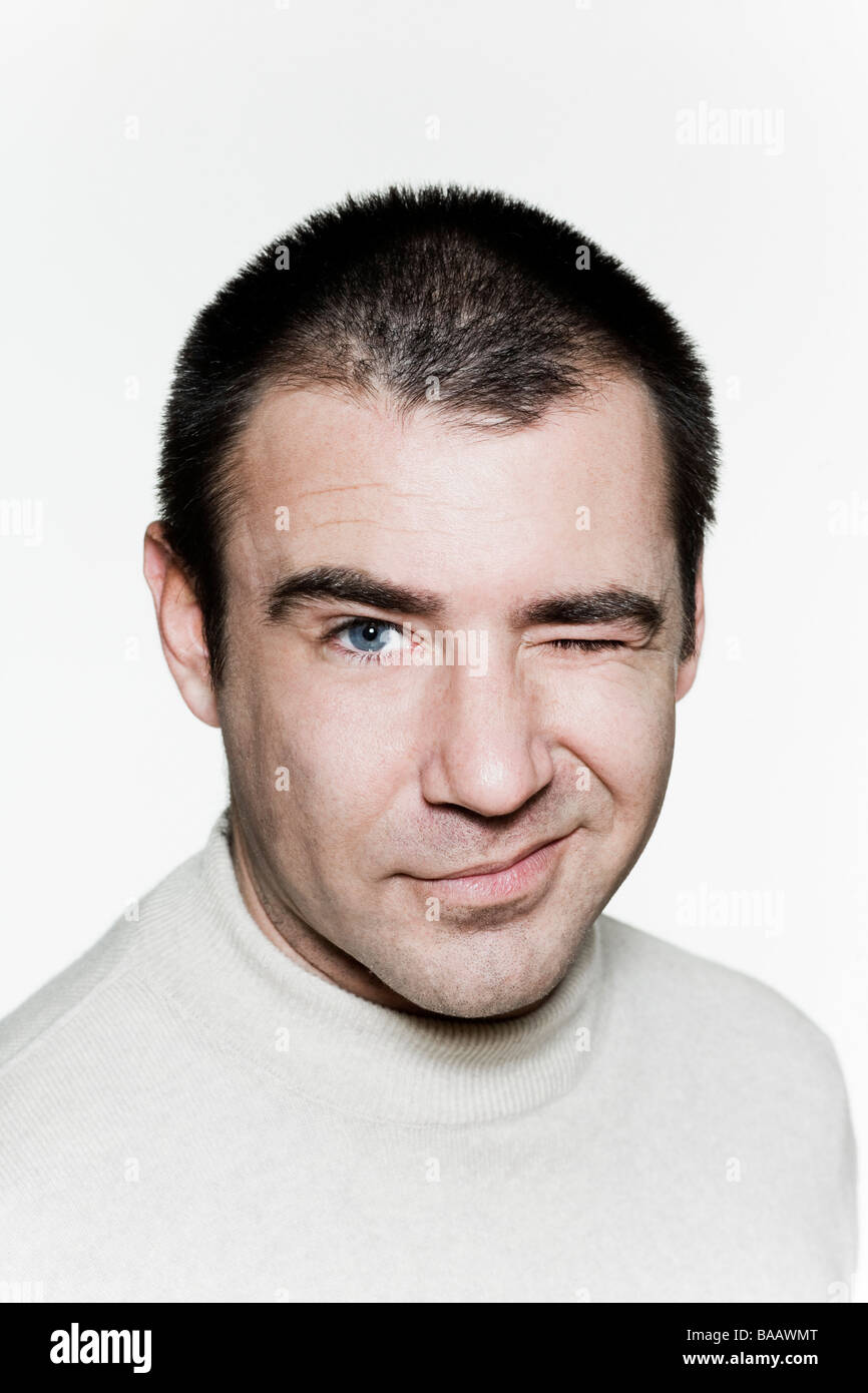 Portrait of an handsome expressive man in studio on white isolated ...