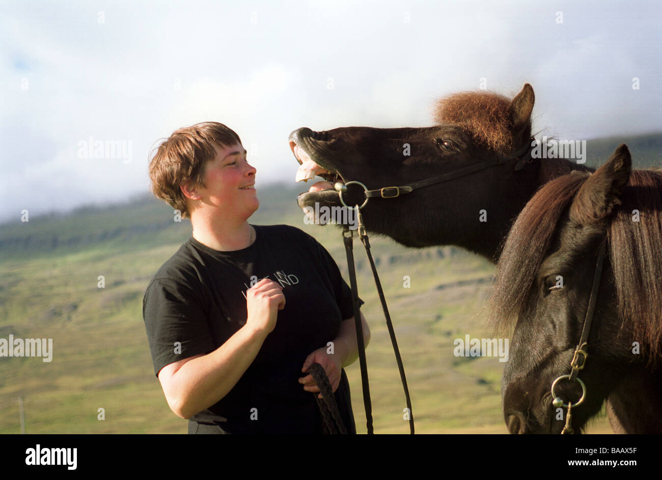 Evelyn Kuhne with Icelandic horses, Varmahlid, Iceland Stock Photo
