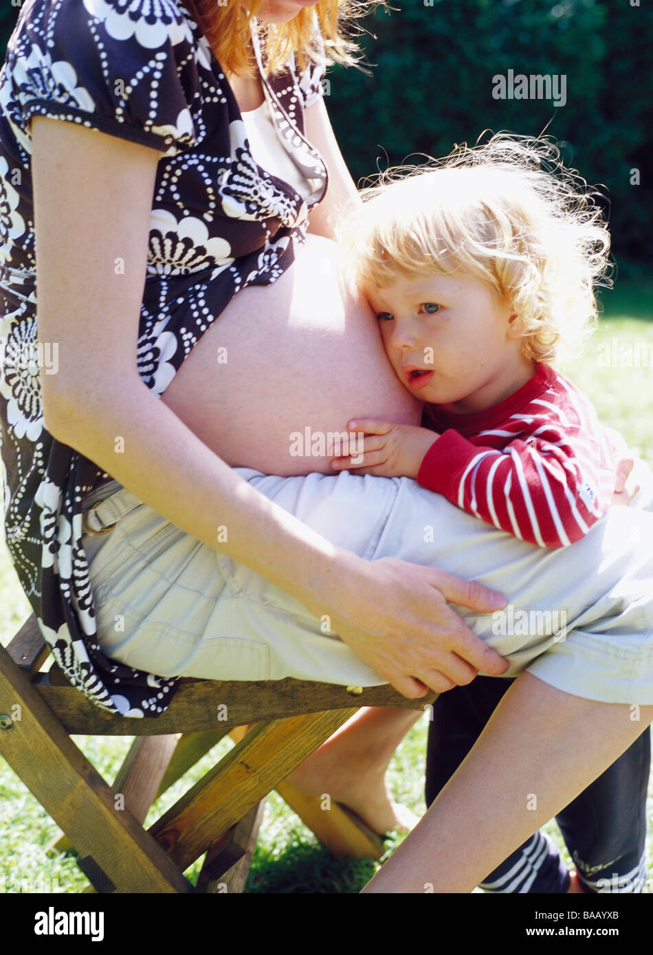 A pregnant mother and her child, Sweden. Stock Photo
