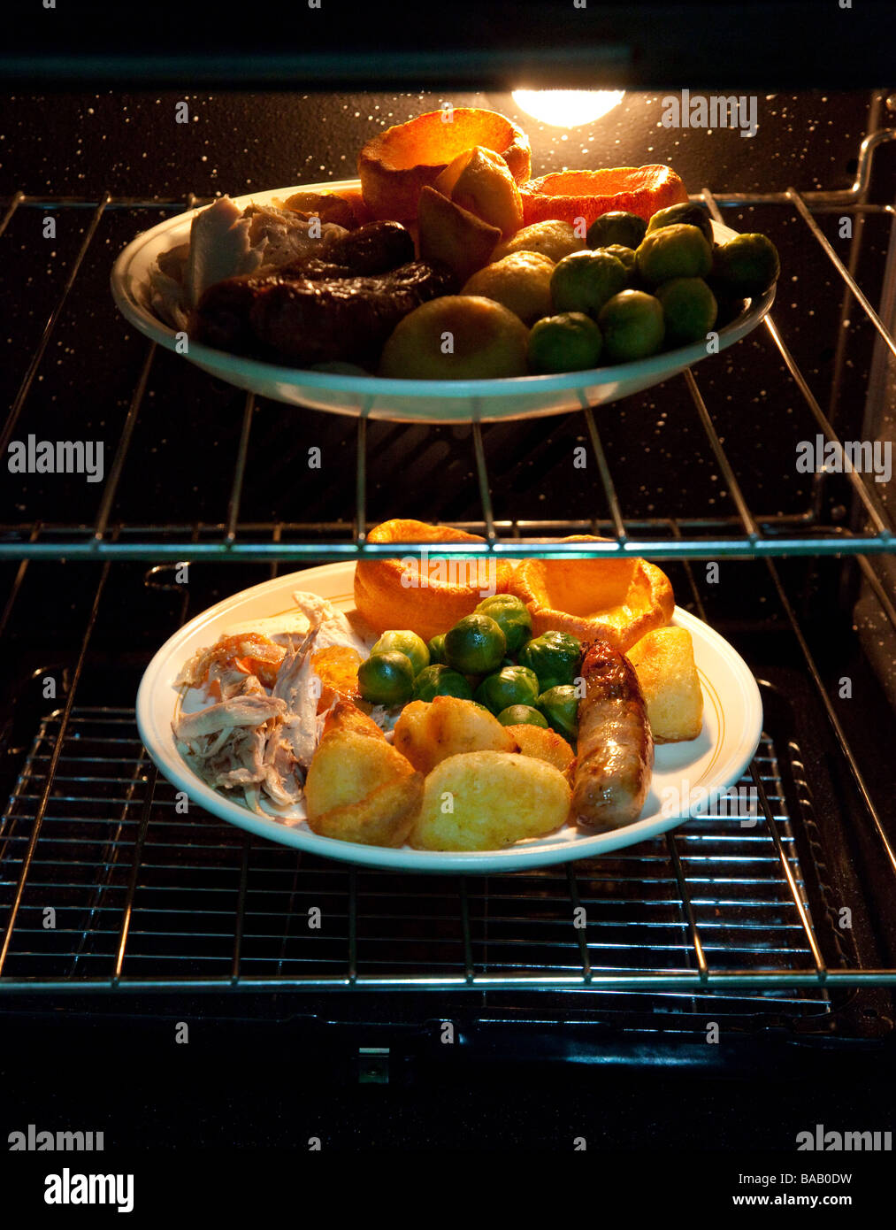 roast dinner kept warm in oven Stock Photo Alamy