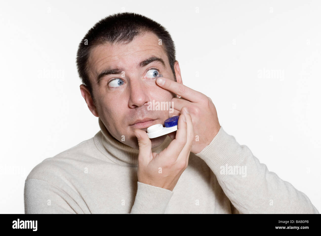 Portrait of an handsome expressive man in studio on white isolated ...