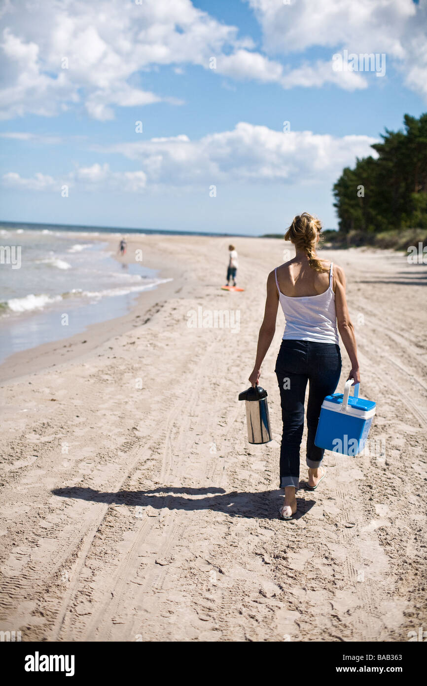 Mother and children walking on a beach, Gotland, Sweden. Stock Photo