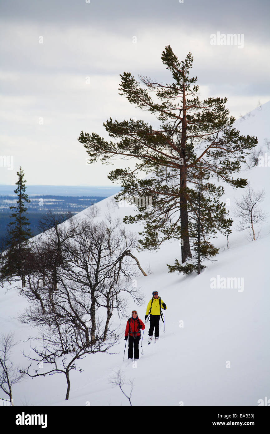 Skiers climbing a mountain Sweden Stock Photo