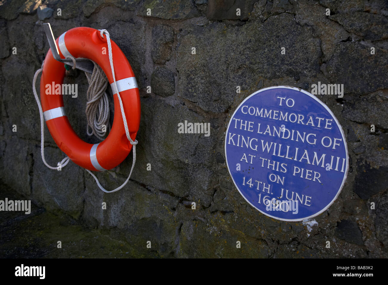 King William III of orange commemoration Blue plaque on the pier of Carrickfergus harbour Carrickfergus Country Antrim Stock Photo