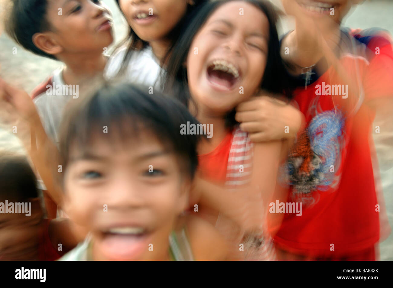 Happy children on a beach, the Philippines. Stock Photo