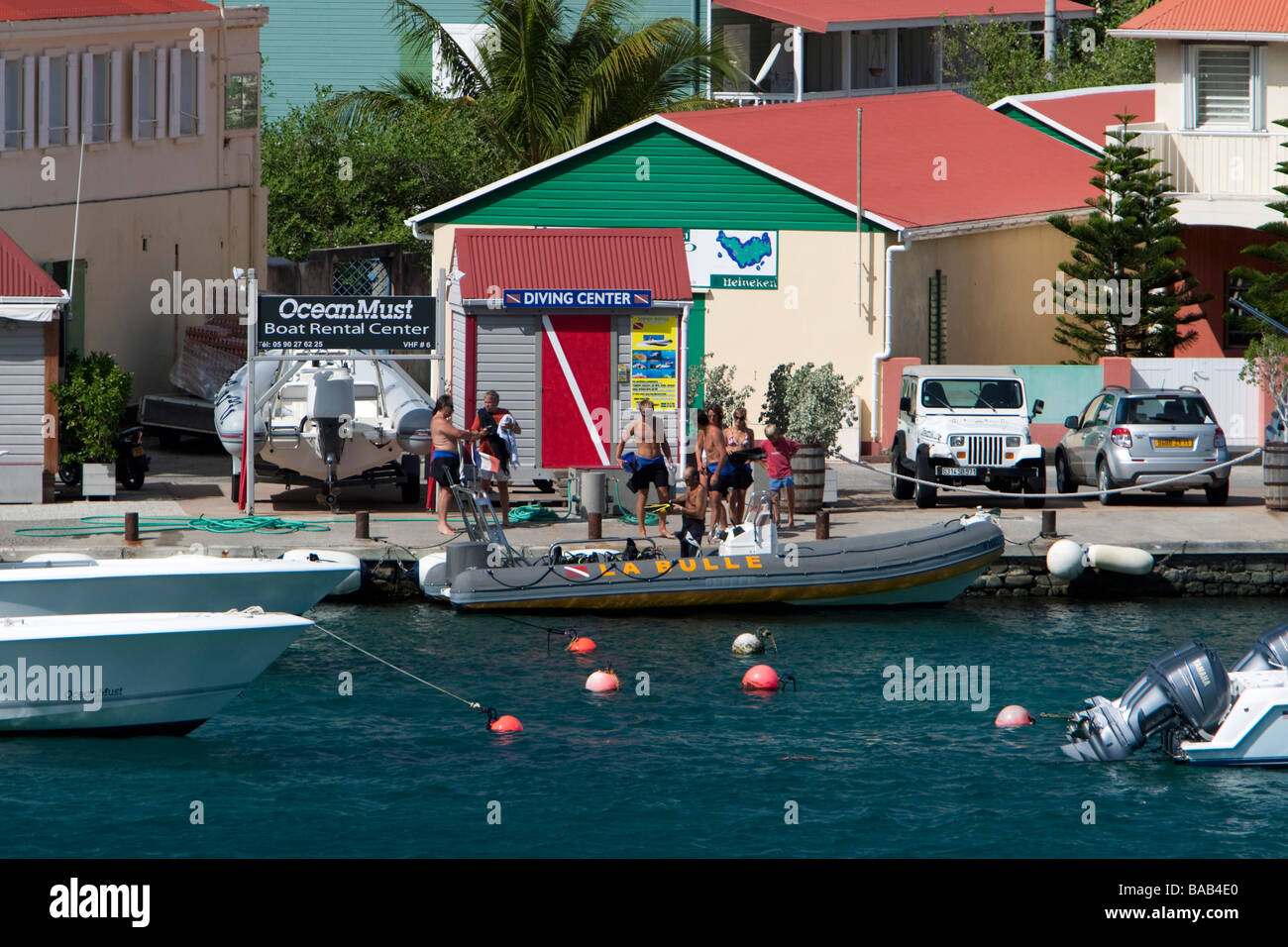 Inflatable dive boat is prepared to leave dock Gustavia port St Barts Stock Photo