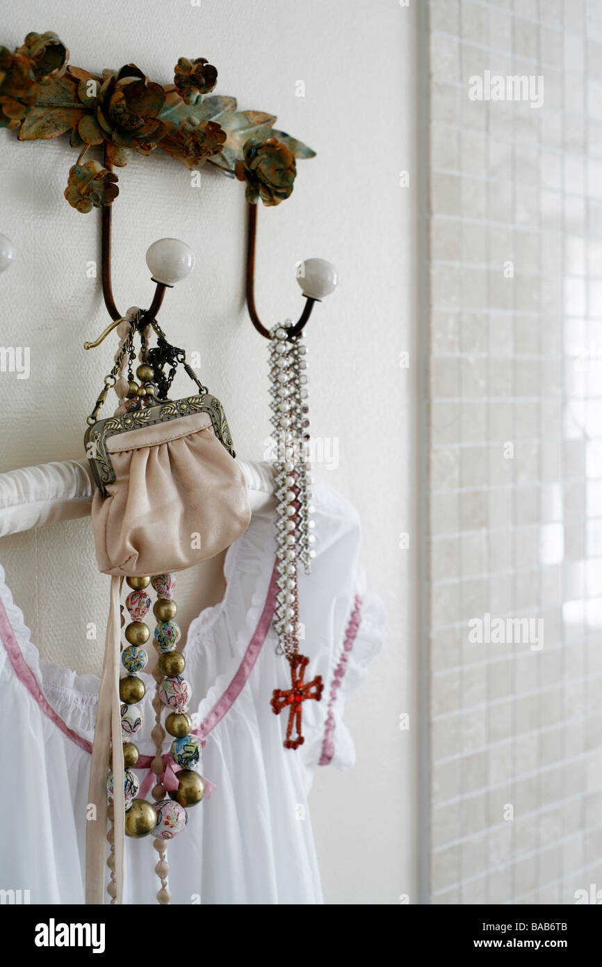 Pieces Of Jewellery Hanging On A Hook Stock Photo Alamy