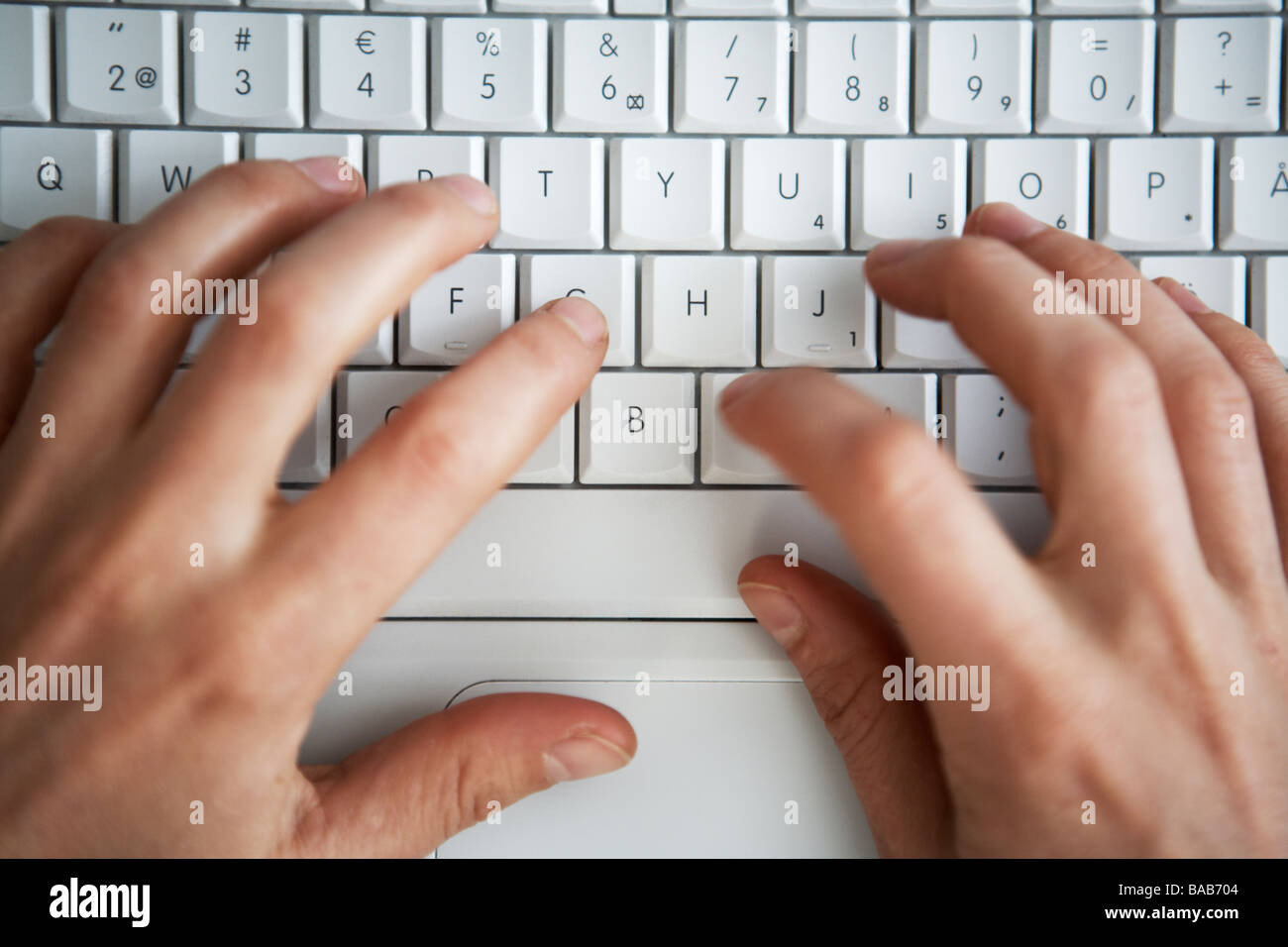 Hands Writing On A Computer Keyboard Close-up Stock Photo - Alamy