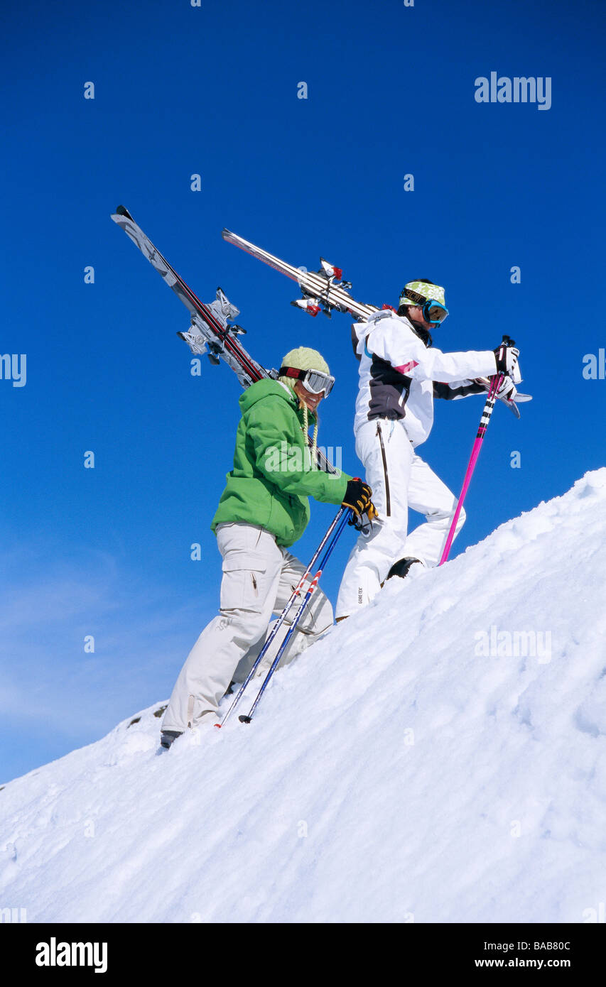 Two skiers climbing a mountain Sweden. Stock Photo