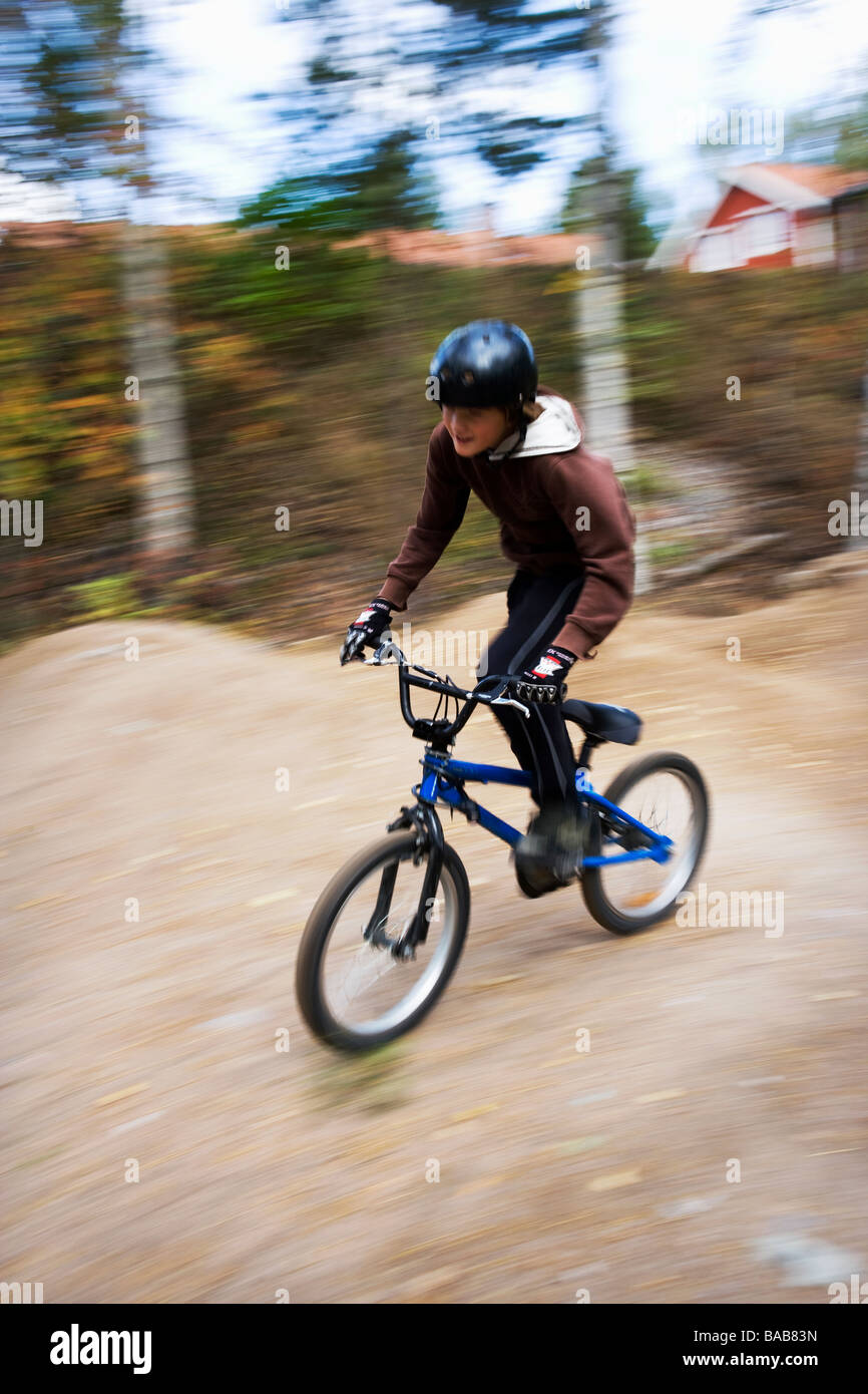 A boy on a BMX bicycle, Sweden. Stock Photo