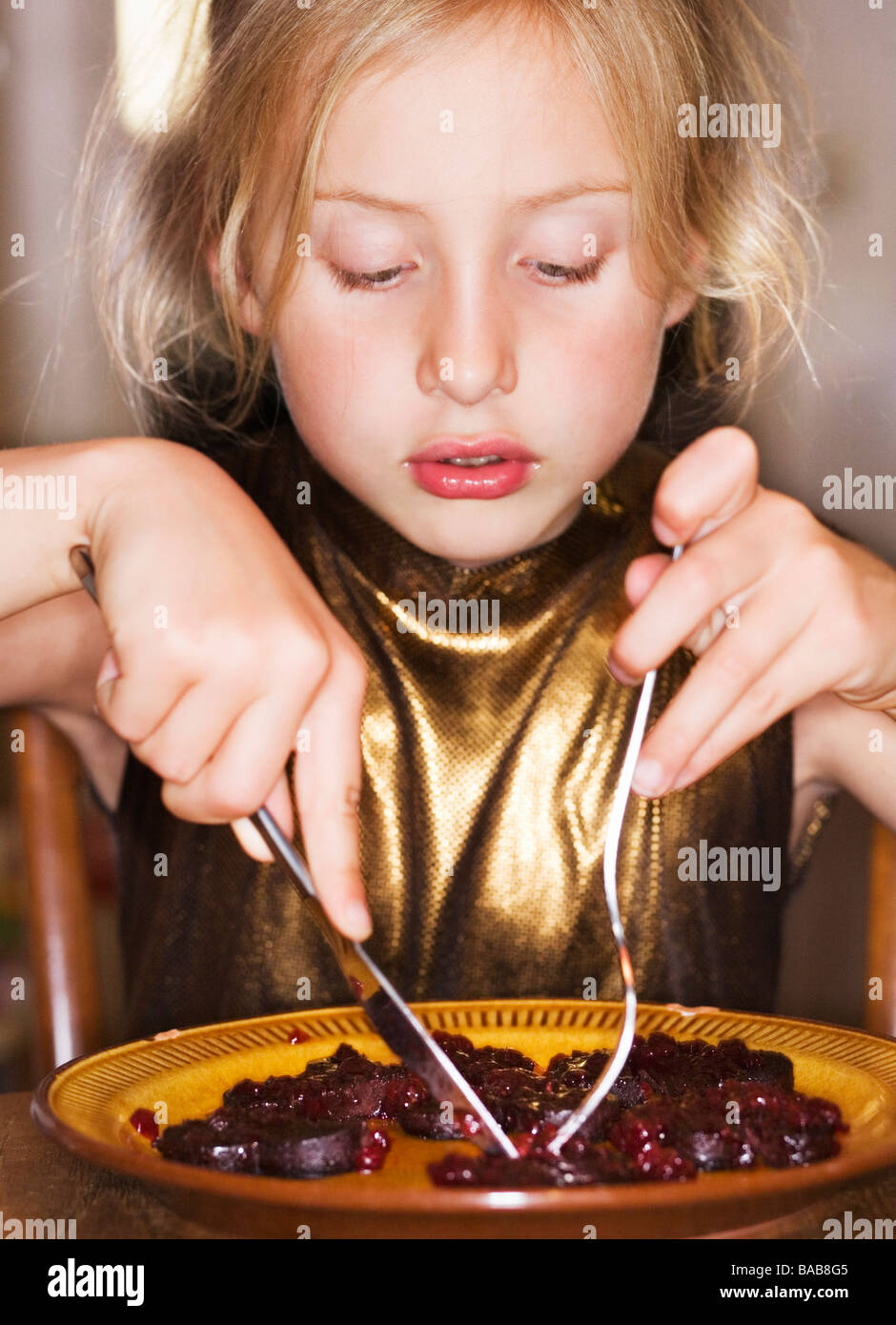 A girl eating food. Stock Photo