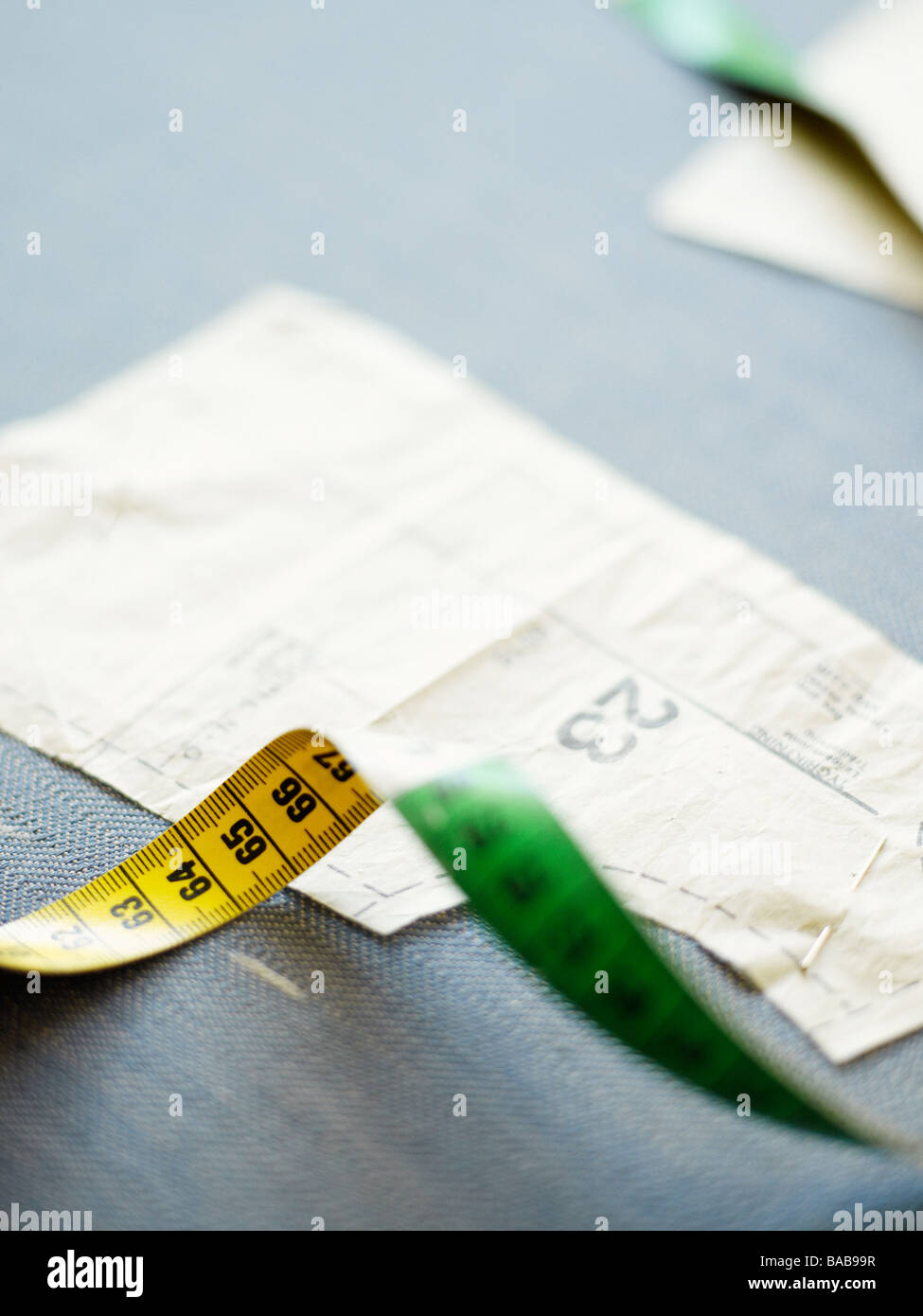 Measuring-tape and a pattern Sweden. Stock Photo