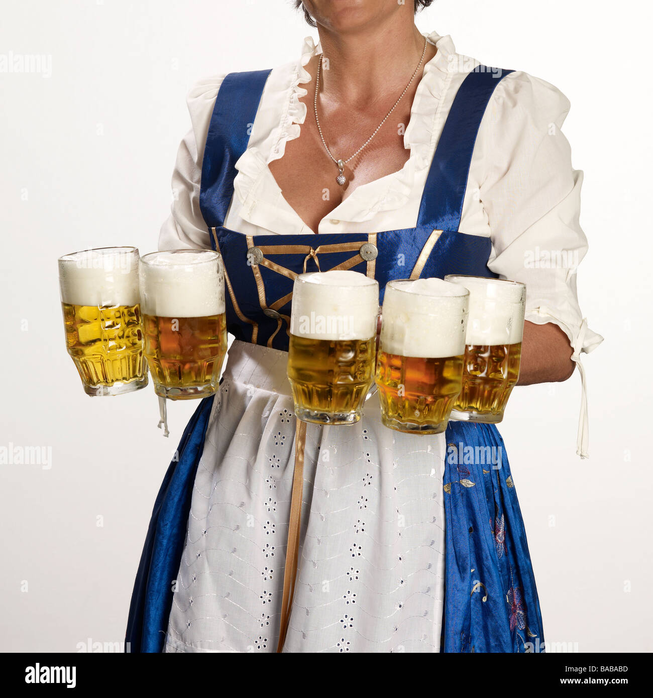 waitress WITH FIVE beer mugs, cut out, Muinch Bavaria GERMANY Europe Stock Photo